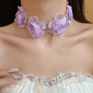 Detailed close-up showing the intricate lace and purple flower design of this summer choker.