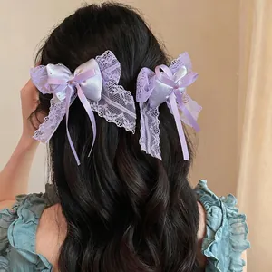 Elegant purple lace bow hair clips with satin ribbons for women's hairstyle decoration