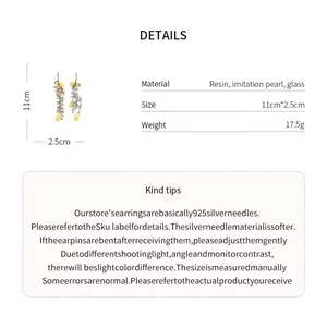 Detail view of lemon tassel earrings showing dimensions, materials and weight specifications