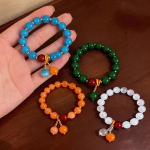Braccialetti vintage di perline occhio di gatto blu, verde, arancio e bianco