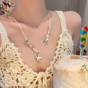 Bohemian handmade starfish and shell beaded woven necklace perfect for beach vacation style