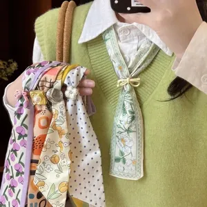 Chiffon floral and polka dot neckerchiefs in Korean pastoral style with decorative clips.