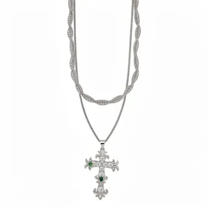 Elegant double layered zircon cross pendant necklace with green accents in silver finish