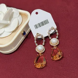 Elegant 18k gold plated drop earrings with pearl and champagne pear-shaped zircon
