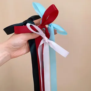 Sweet ballet style satin ribbon bow hair clips with long streamers in four colors.