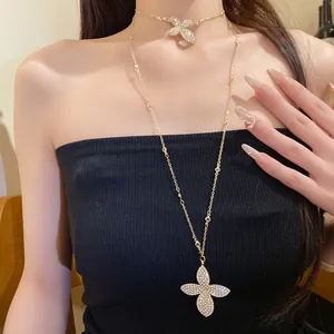 Detailed shot of a double-layer rhinestone flower necklace worn by an elegant model