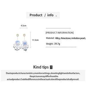 Detailed specifications for elegant resin flower tassel earrings with blue bead accents