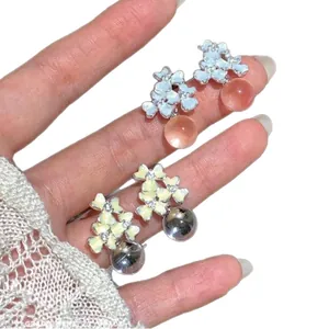 Elegant enamel flower earrings with sparkling rhinestones in Korean ins style design.