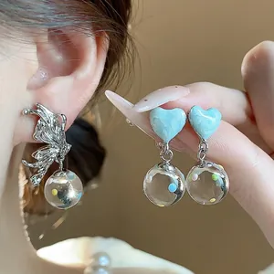 Elegant silver butterfly and light blue heart glass ball drop earrings for women
