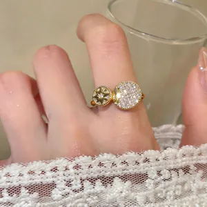 Macro view of gold-plated octagram ring with shimmering pave-set cubic zirconia