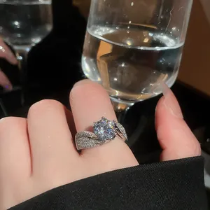 Close-up of a 14k gold plated ring featuring a large sparkling cubic zirconia centerpiece