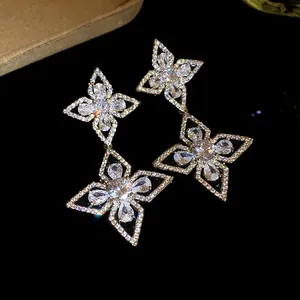 Luxury silver needle zircon flower drop earrings with sparkling pear-cut stones for women.