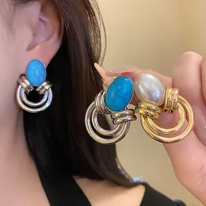 Eleganti orecchini vintage in argento con turchese ovale e perla stile retrò