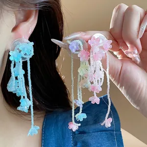 Handmade glass flower tassel earrings with long beaded fringe for vacation style