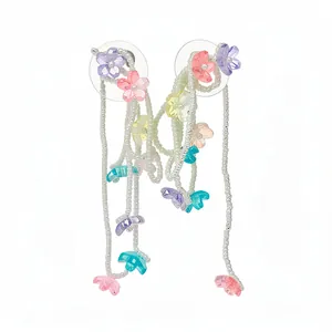 Colorful glass flower tassel stud earrings with silver needles and beaded strands.