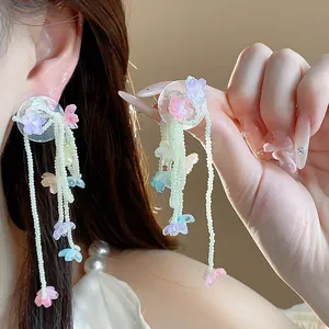 Bohemian glass flower tassel drop earrings with delicate bead strands and silver pins