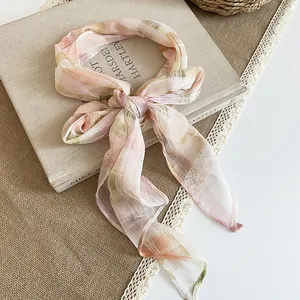 Elegant Korean style floral chiffon square scarf tied as a bow for a pastoral look