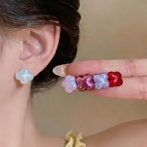 Elegant pearl-lustre flower stud earrings for women in five vibrant colors set