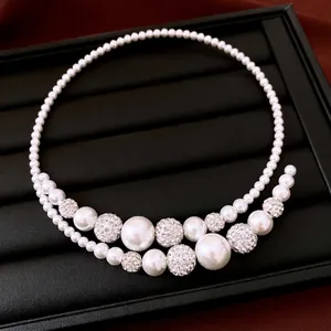 Elegant white baroque pearl choker necklace featuring sparkling rhinestone crystal beads