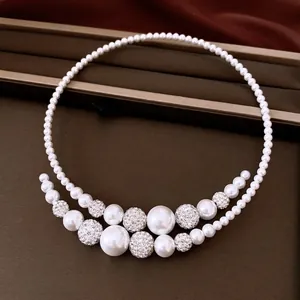 Elegant double-layered white pearl choker necklace with sparkling crystal pave beads