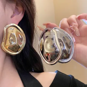 Large metallic irregular oval pleated earrings for women in gold and silver finish