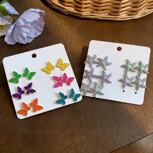 Conjuntos de pendientes de botón de mariposa y estrella de mar en esmalte de verano