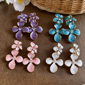 Set of vintage floral enamel stud earrings with rhinestones in four elegant colors