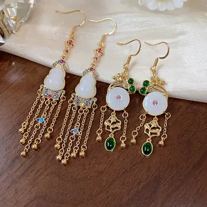 Detail view of neo-Chinese vintage earrings with gourd and floral motifs