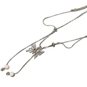 Elegant silver double-layer butterfly tassel necklace with an adjustable sliding bolo chain