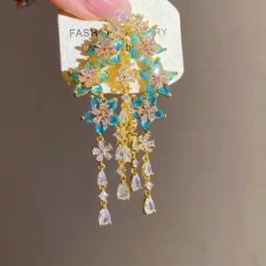 Elegant floral zircon tassel drop earrings featuring sparkling blue and pink stones