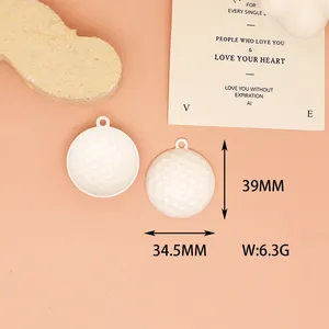 Detailed macro shot of white golf ball alloy pendant with 39mm height and 6.3g weight