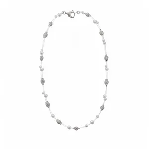 Elegant multi-strand white pearl and pavé rhinestone beaded necklace on clear cord