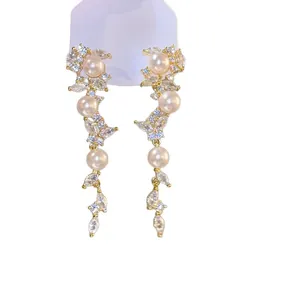 Elegant gold-tone leaf tassel zircon and pearl clip-on earrings for non-pierced ears