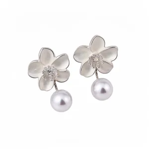 French vintage flower drop earrings with white pearls and sparkling crystal center