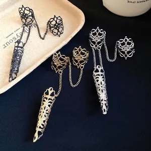 Gothische hohle Fingerpanzer Ringe mit Kette in Gold Silber Schwarz Farben Schmuckset