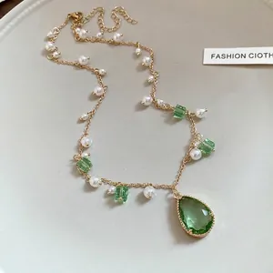 Retro style vintage green pearl pendant necklace with teardrop gemstone for women