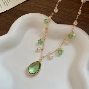 Retro green pearl pendant necklace with gold chain and emerald teardrop crystal