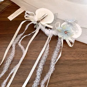 Sweet floral butterfly hair clips with lace tassels and rhinestone details for women