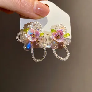 Elegant handmade floral stud earrings with pearls and colorful cat's eye stone beads