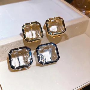 Elegant minimalist square faceted glass stud earrings in gold and silver finish for women