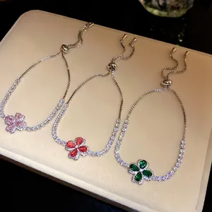 Elegant zircon clover flower adjustable bracelets in pink, red and green colors.