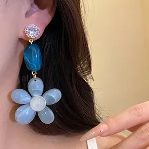 Blue resin flower pendant earrings with zircon studs for summer beach vacation style.