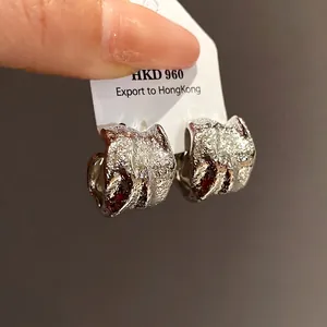 Vintage textured silver C-shaped hoop earrings with crinkled metallic finish