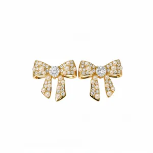 Elegant 18k gold plated bow stud earrings with pearls and brilliant cubic zirconia