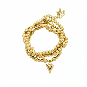 Set collana e bracciale a sfere dorate regolabili retrò con un ciondolo a cuore