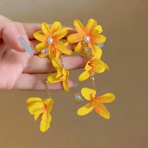 Vibrant yellow fabric flower tassel earrings with pearls and crystals for summer vacation style