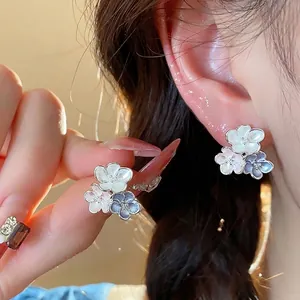 Elegant floral oil-dripping stud earrings with silver needles for a niche aesthetic