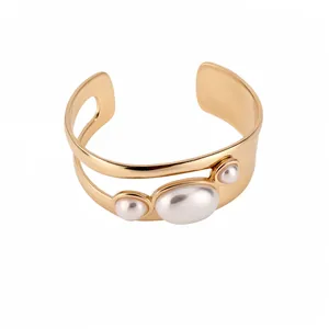 Vintage gold-plated hollow cuff bracelet with elegant faux pearl trio embellishments