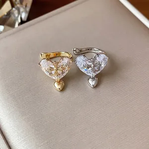 Exquisite 18k gold plated heart zircon ear cuff for non-pierced ears featuring a cross motif