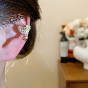 Elegant 18k gold plated heart zircon ear cuff with cross detail for non-pierced ears